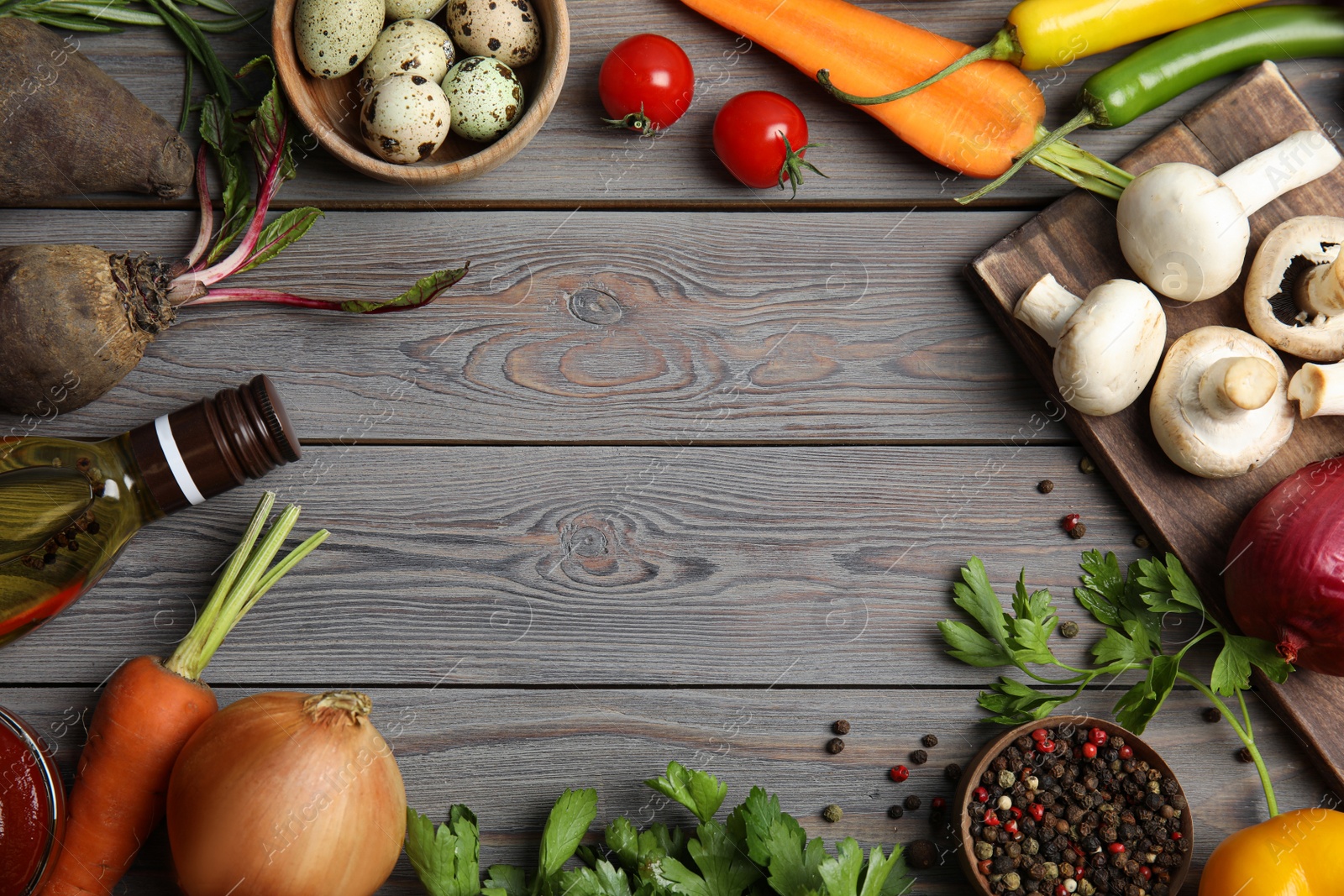 Photo of Frame of ingredients for cooking on wooden table, flat lay. Space for text