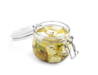 Photo of Open jar with feta cheese marinated in oil on white background. Pickled food