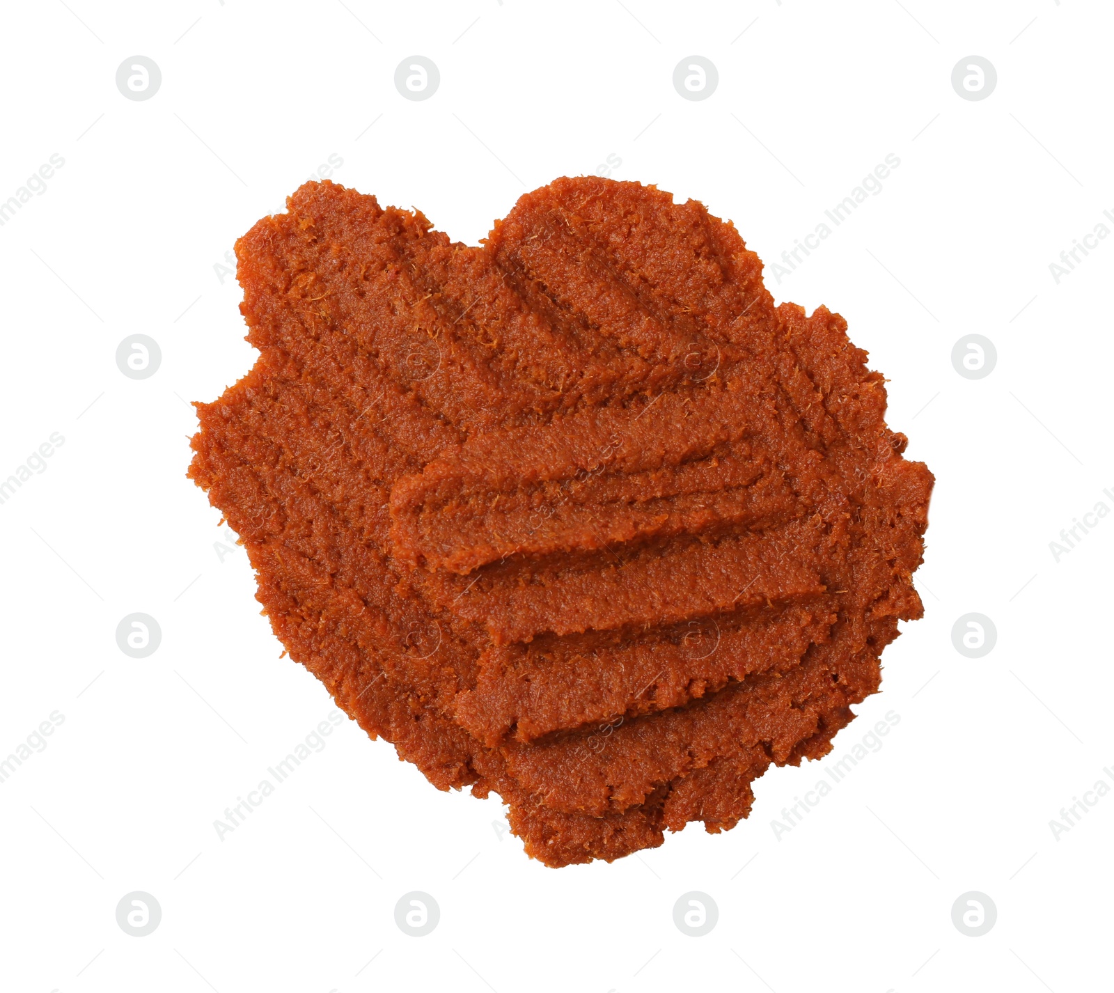 Photo of Red curry paste isolated on white, top view