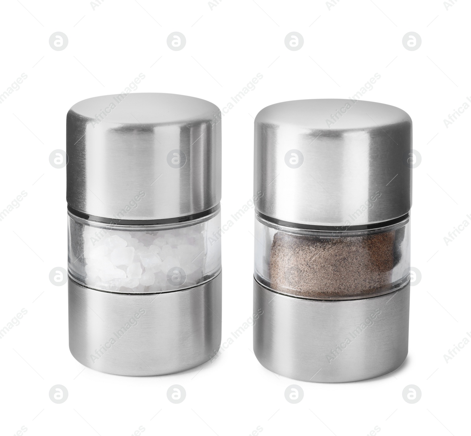 Photo of Pepper and salt in shakers isolated on white