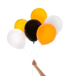 Woman holding color balloons for Halloween party on white background, closeup