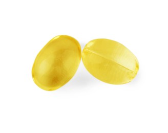 Vitamin capsules isolated on white, top view. Health supplements