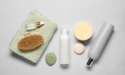 Photo of Bath accessories. Flat lay composition with personal care products on light grey background