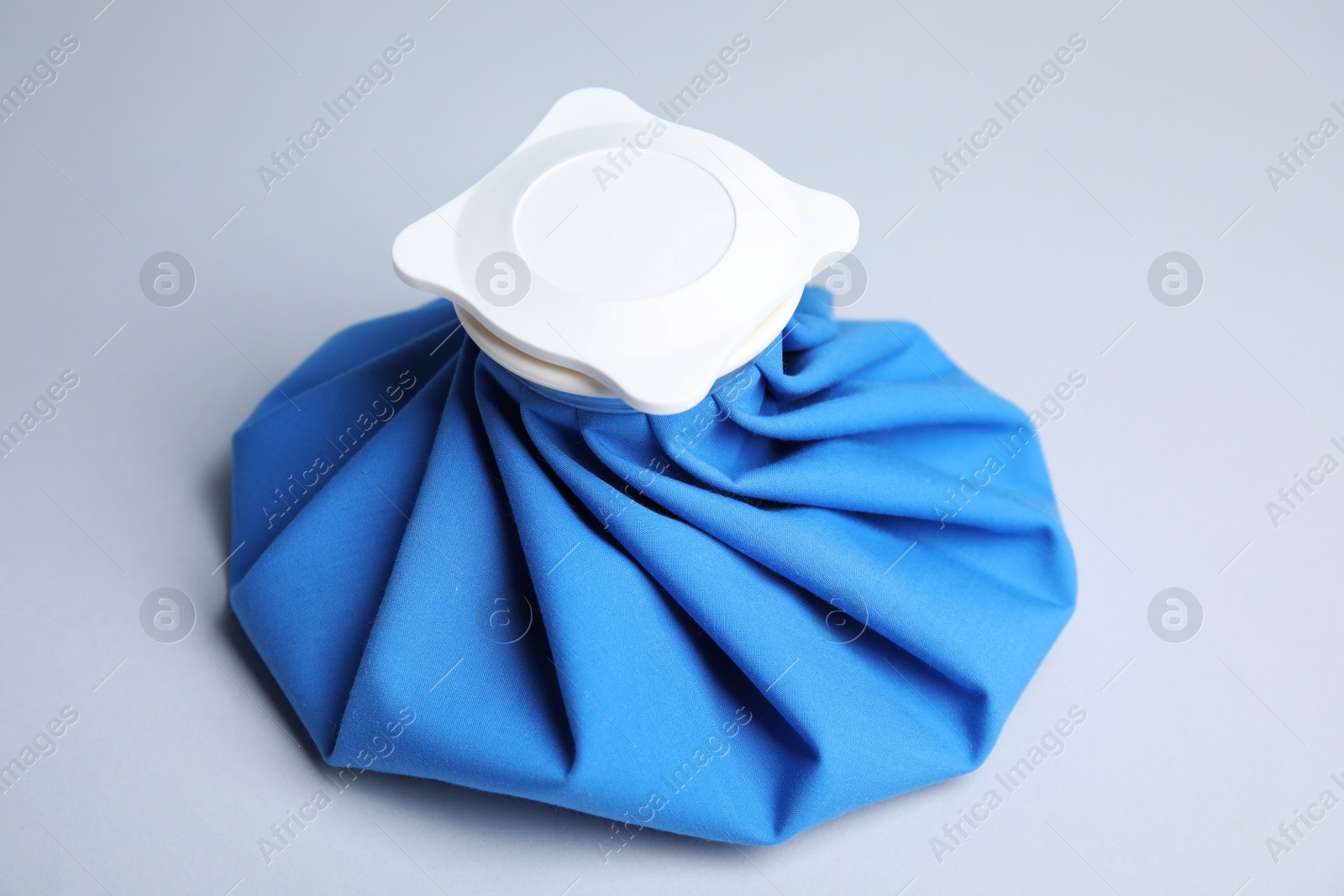 Photo of Ice pack on light background. Cold compress