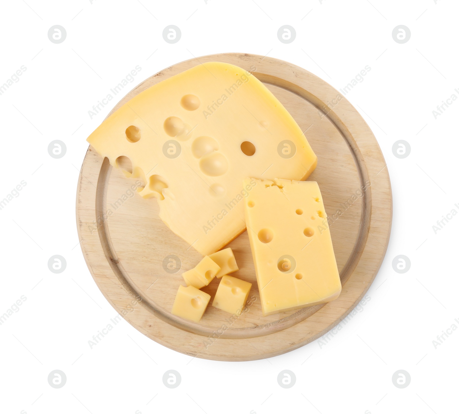 Photo of Cut fresh delicious cheese isolated on white, top view