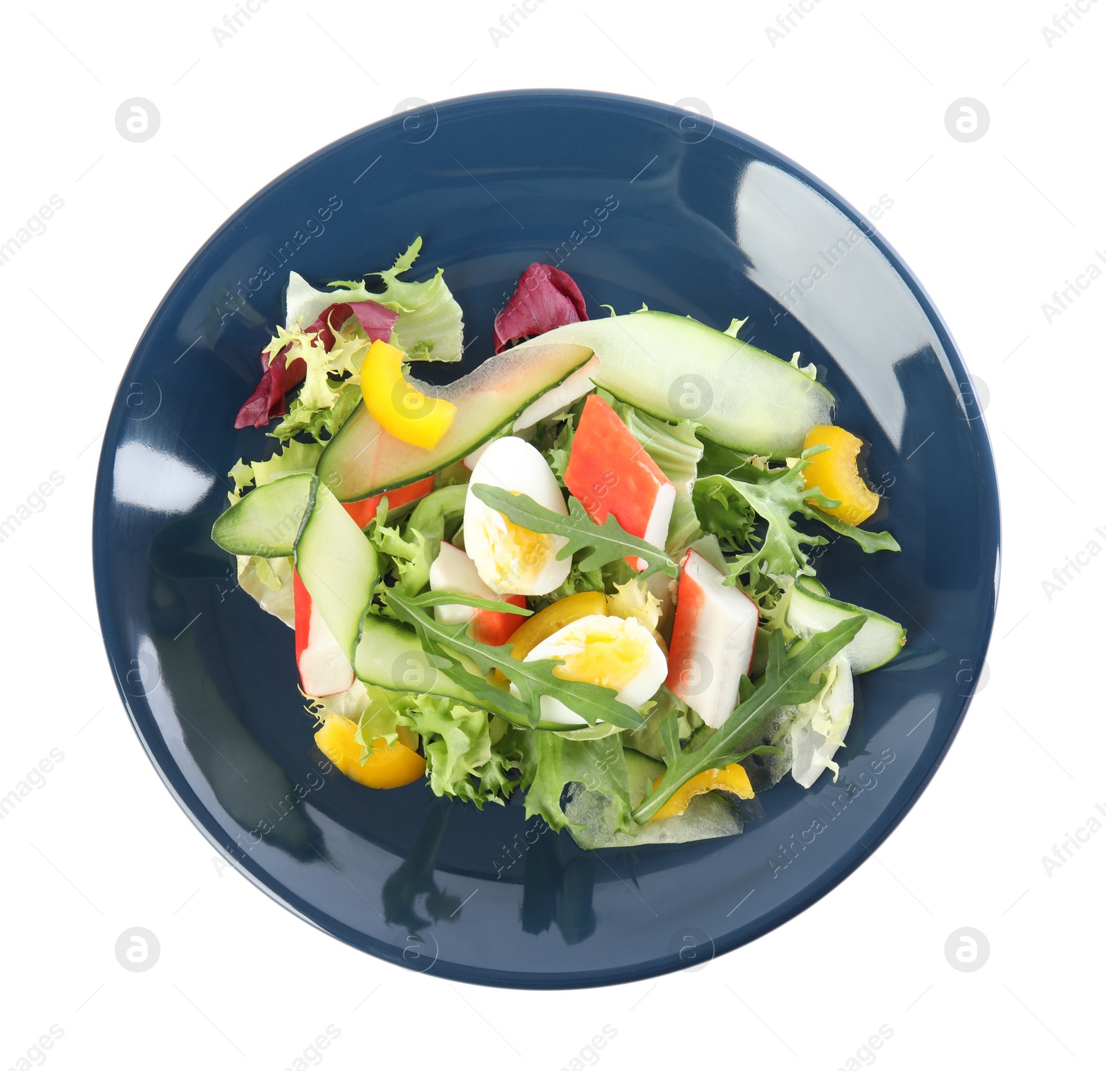 Photo of Delicious salad with crab sticks and lettuce on white background, top view