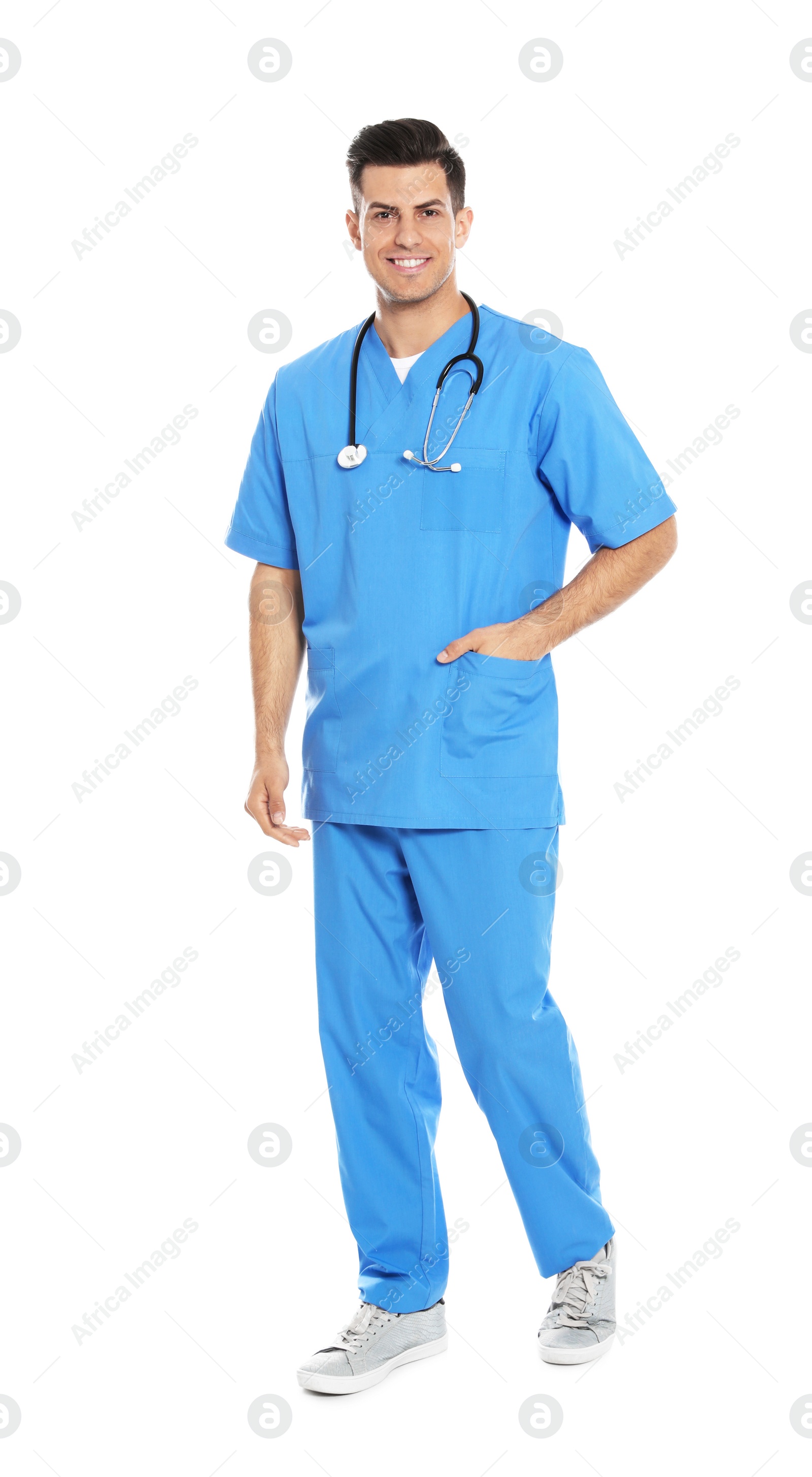 Photo of Full length portrait of medical doctor with stethoscope isolated on white