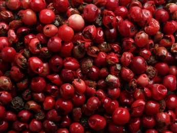 Photo of Many red peppercorns as background, top view