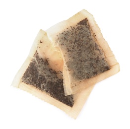 Photo of Used tea bags on white background, top view