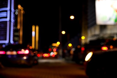 Photo of Blurred view of cityscape with bokeh effect. Night life