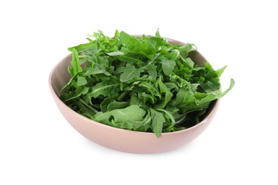 Photo of Delicious fresh arugula in bowl isolated on white