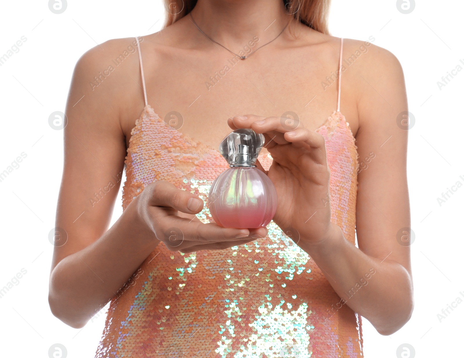 Photo of Young woman with perfume bottle on white background, closeup
