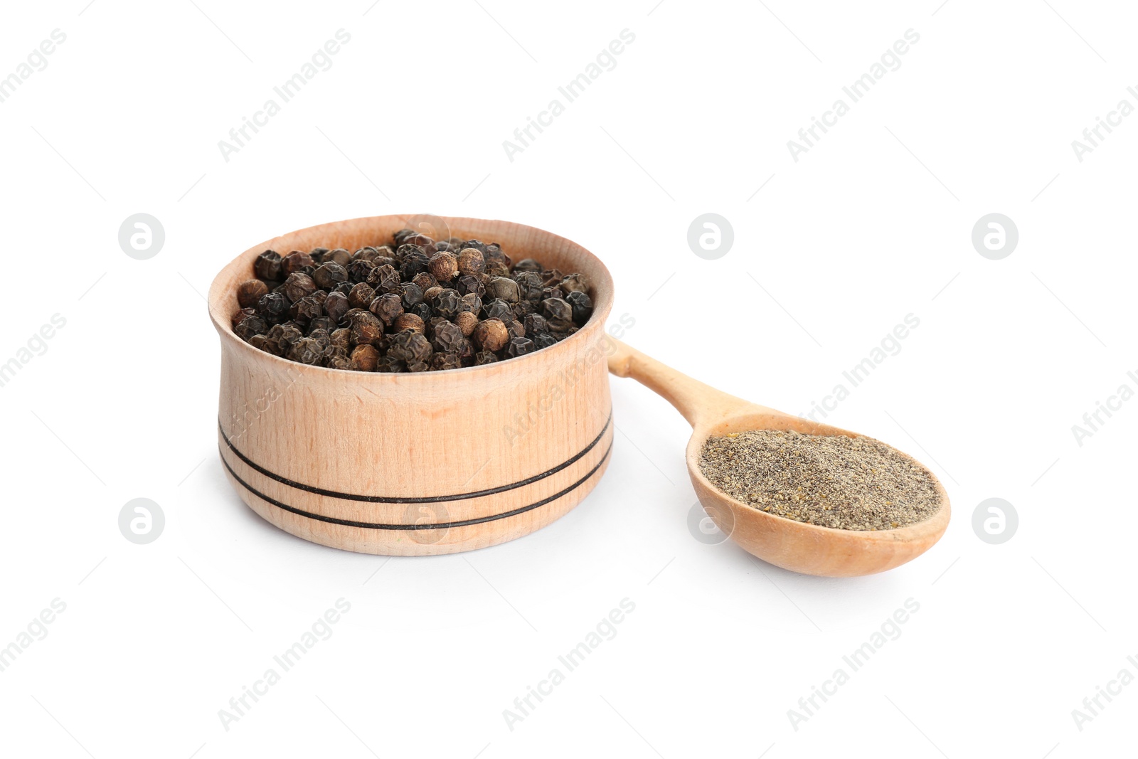 Photo of Ground black pepper and corns isolated on white
