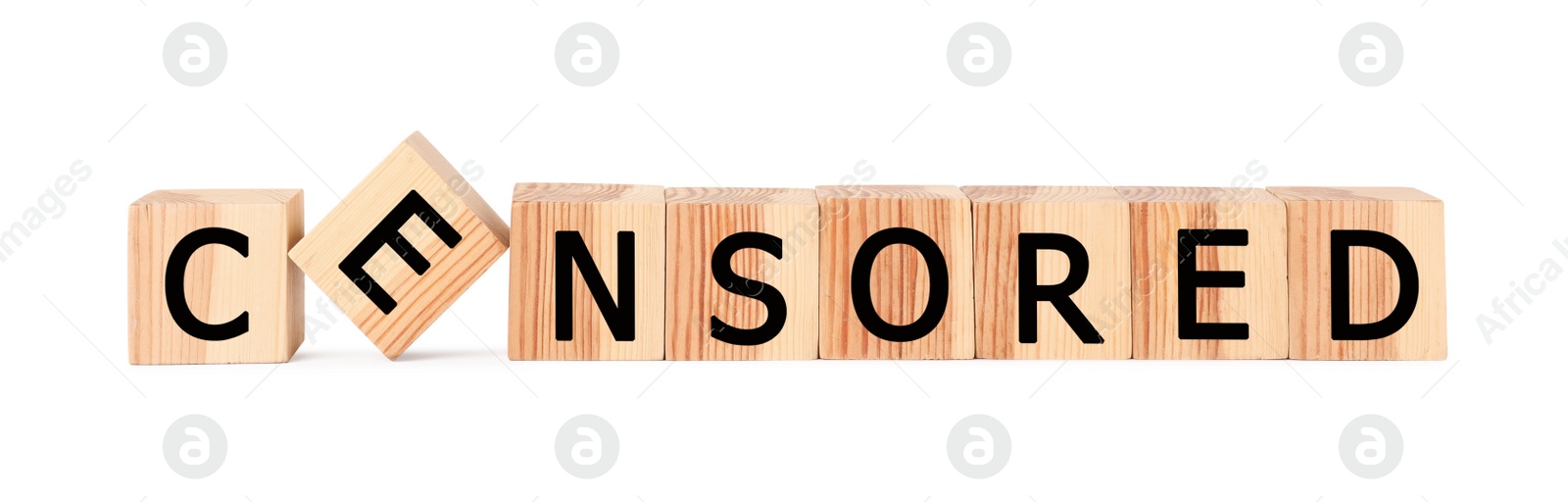 Photo of Wooden cubes with word Censored on white background