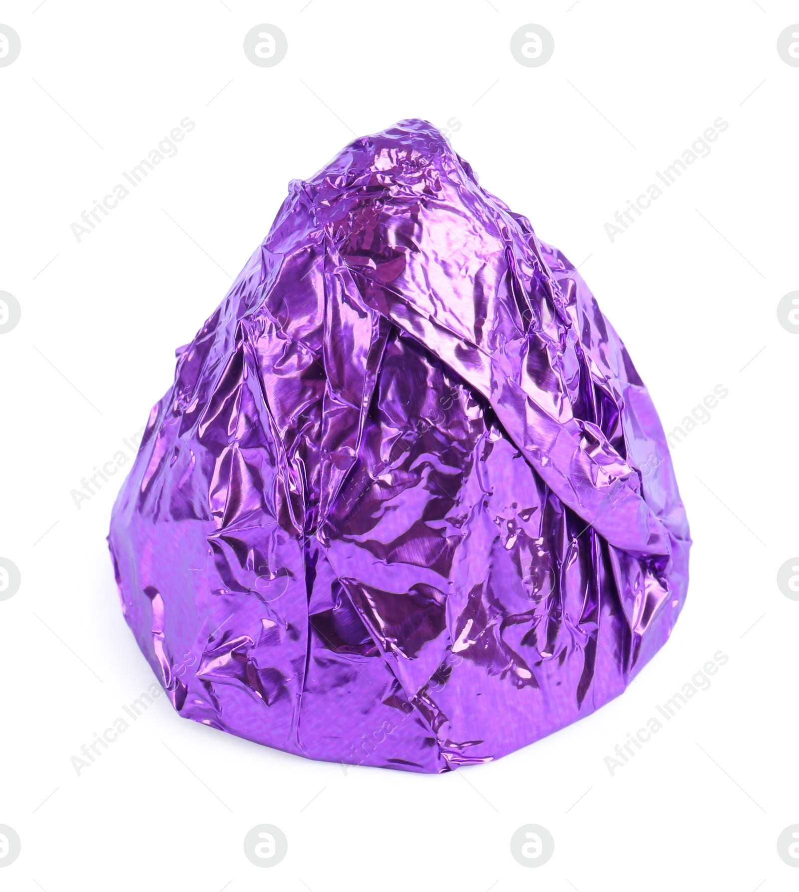 Photo of Tasty candy in purple wrapper isolated on white