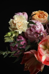 Beautiful bouquet of fresh flowers on dark background