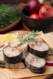 Photo of Slices of tasty salted mackerel and onion on table, closeup