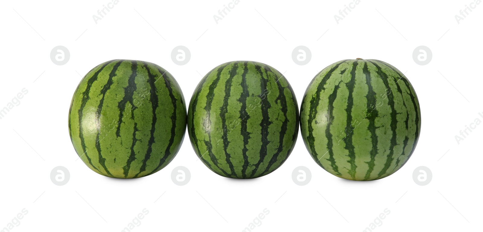 Photo of Delicious whole ripe watermelons isolated on white