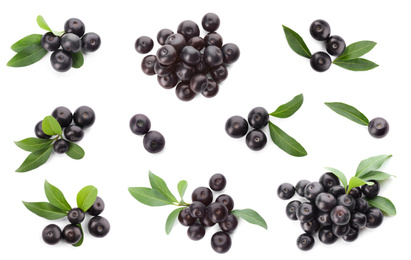 Image of Set of fresh acai berries with green leaves on white background, top view