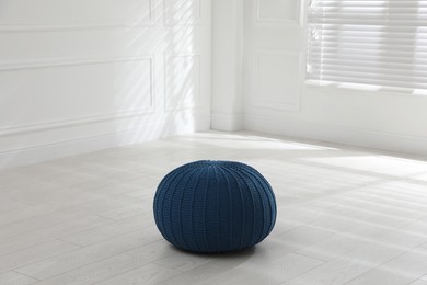 Stylish blue pouf in room. Home design