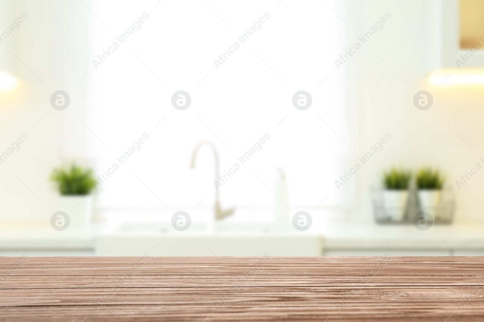 Image of Empty wooden table and blurred view of stylish kitchen interior. Mockup for design