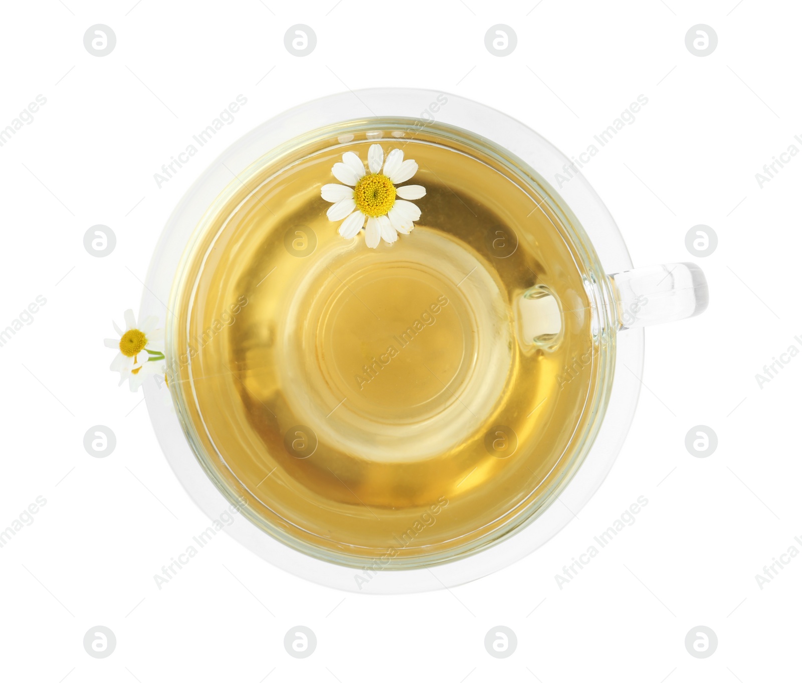 Photo of Delicious chamomile tea in glass cup isolated on white, top view