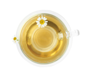 Photo of Delicious chamomile tea in glass cup isolated on white, top view