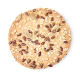 Round cereal cracker with flax, sunflower and sesame seeds isolated on white, top view