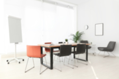 Image of Blurred view of modern office interior 