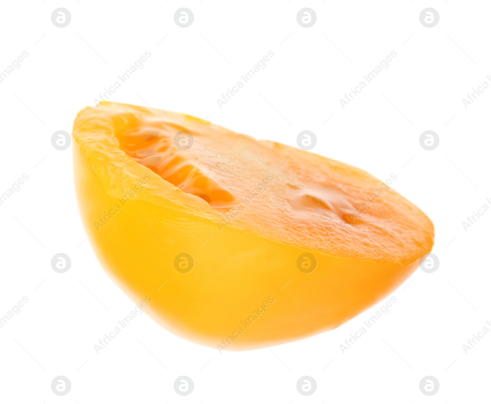 Photo of Slice of yellow tomato on white background