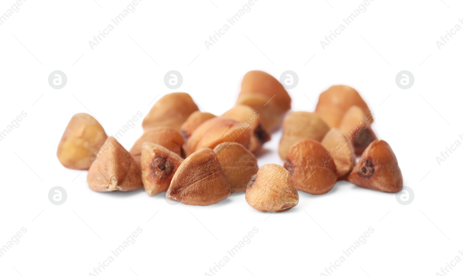 Photo of Buckwheat grains isolated on white. Organic cereal