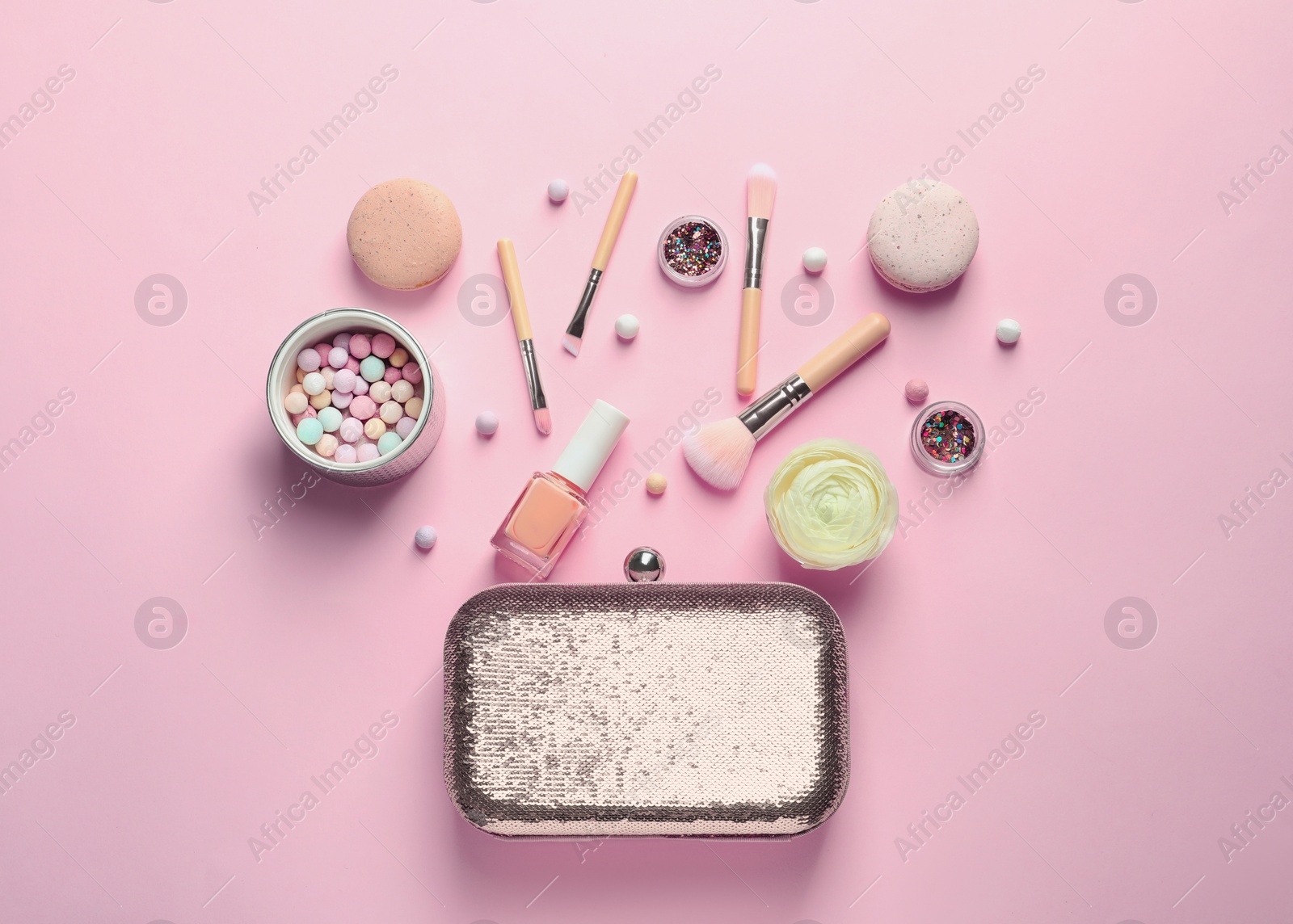 Photo of Makeup products with cosmetic bag on color background