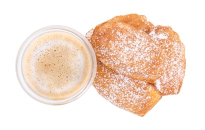 Photo of Delicious madeleine cakes with powdered sugar and glass of latte on white background, top view