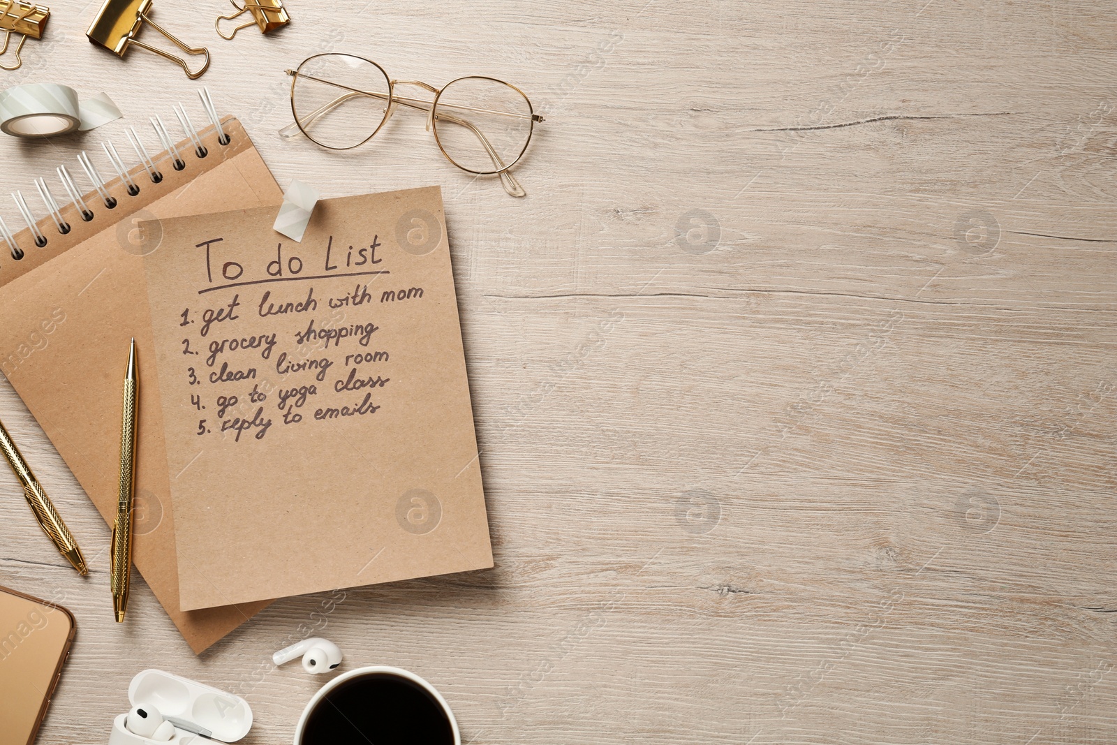 Photo of Flat lay composition with to do list on wooden table, space for text