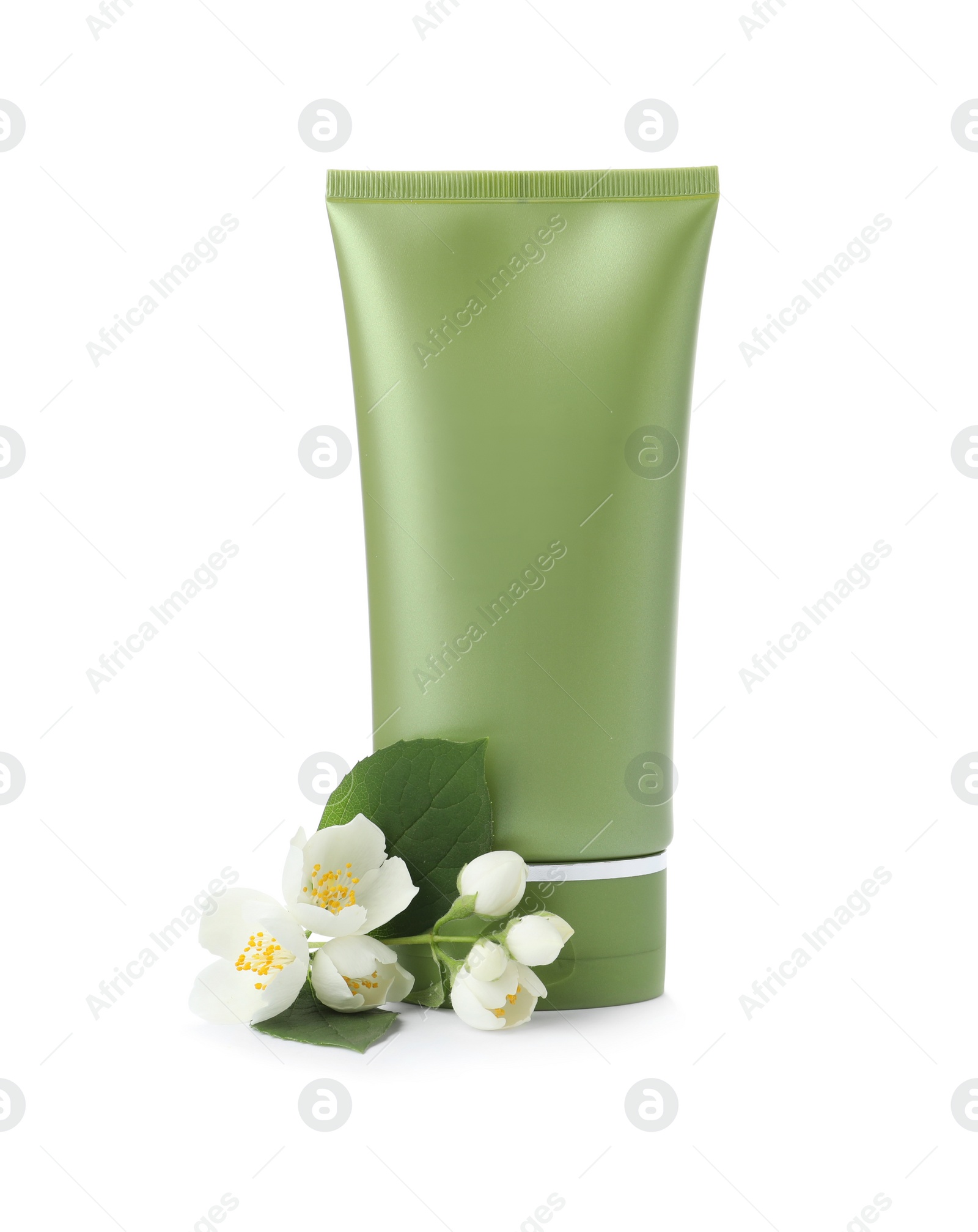 Photo of Tube of cosmetic product and flowers isolated on white