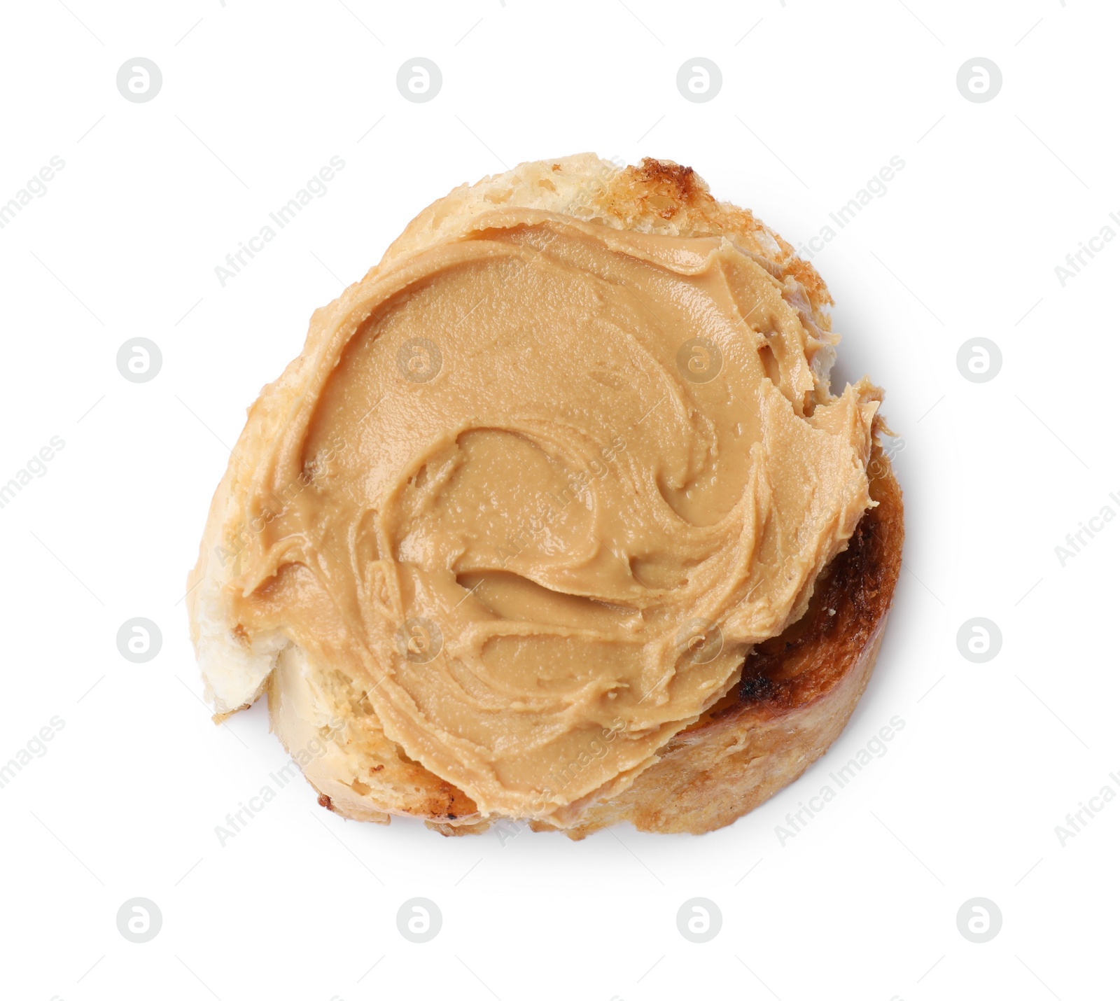 Photo of Piece of toasted bread with peanut butter isolated on white, top view