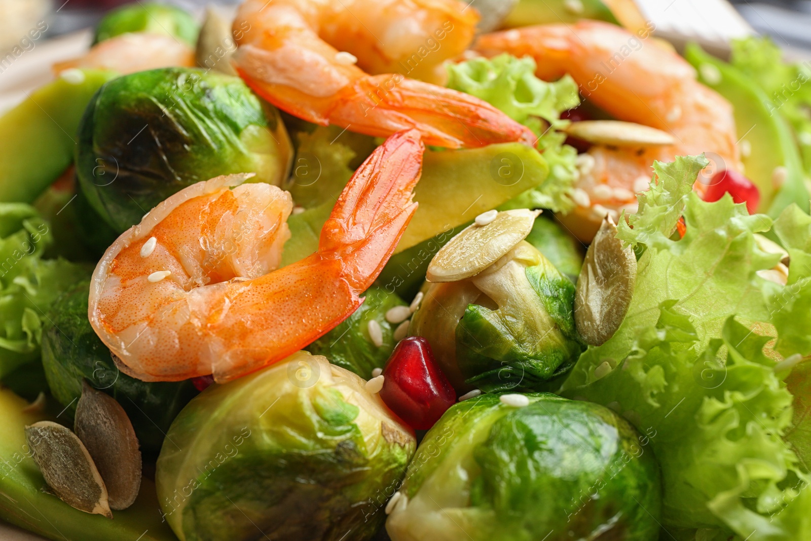 Photo of Tasty salad with Brussels sprouts, closeup view