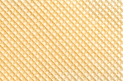 Photo of Tasty wafer as background, closeup. Crispy food