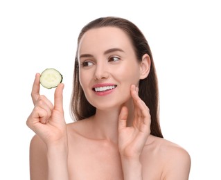 Photo of Beautiful woman with piece of cucumber on white background