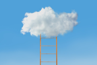 Image of Wooden ladder with cloud on blue background. Conceptual design 