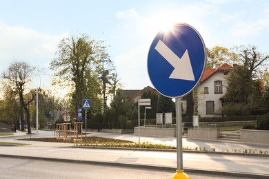 Traffic sign Keep Right on city street, space for text