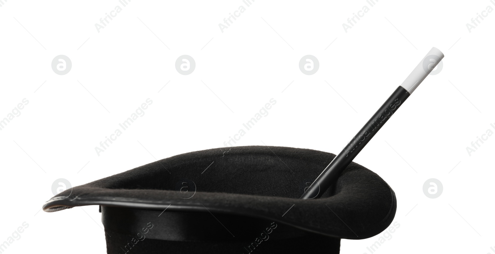 Photo of Magician's hat and wand isolated on white