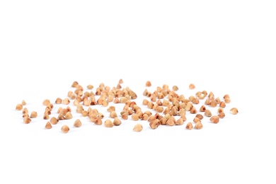 Photo of Uncooked buckwheat on white background. Healthy diet