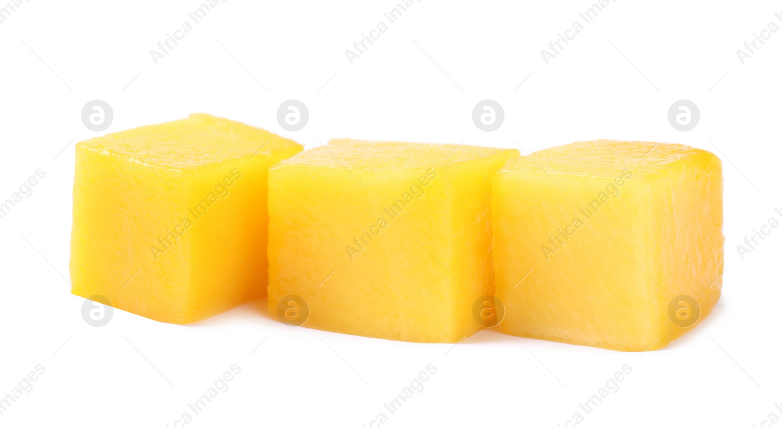 Photo of Fresh juicy mango cubes isolated on white