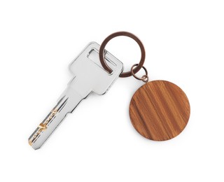 Photo of Key with wooden keychain isolated on white, top view