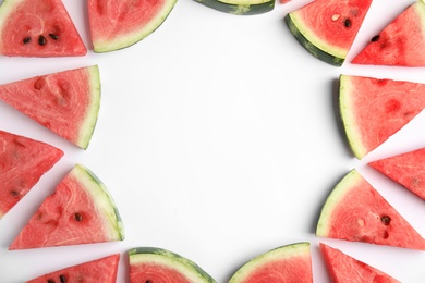 Photo of Frame made with slices of ripe watermelon on white background, flat lay. Space for text