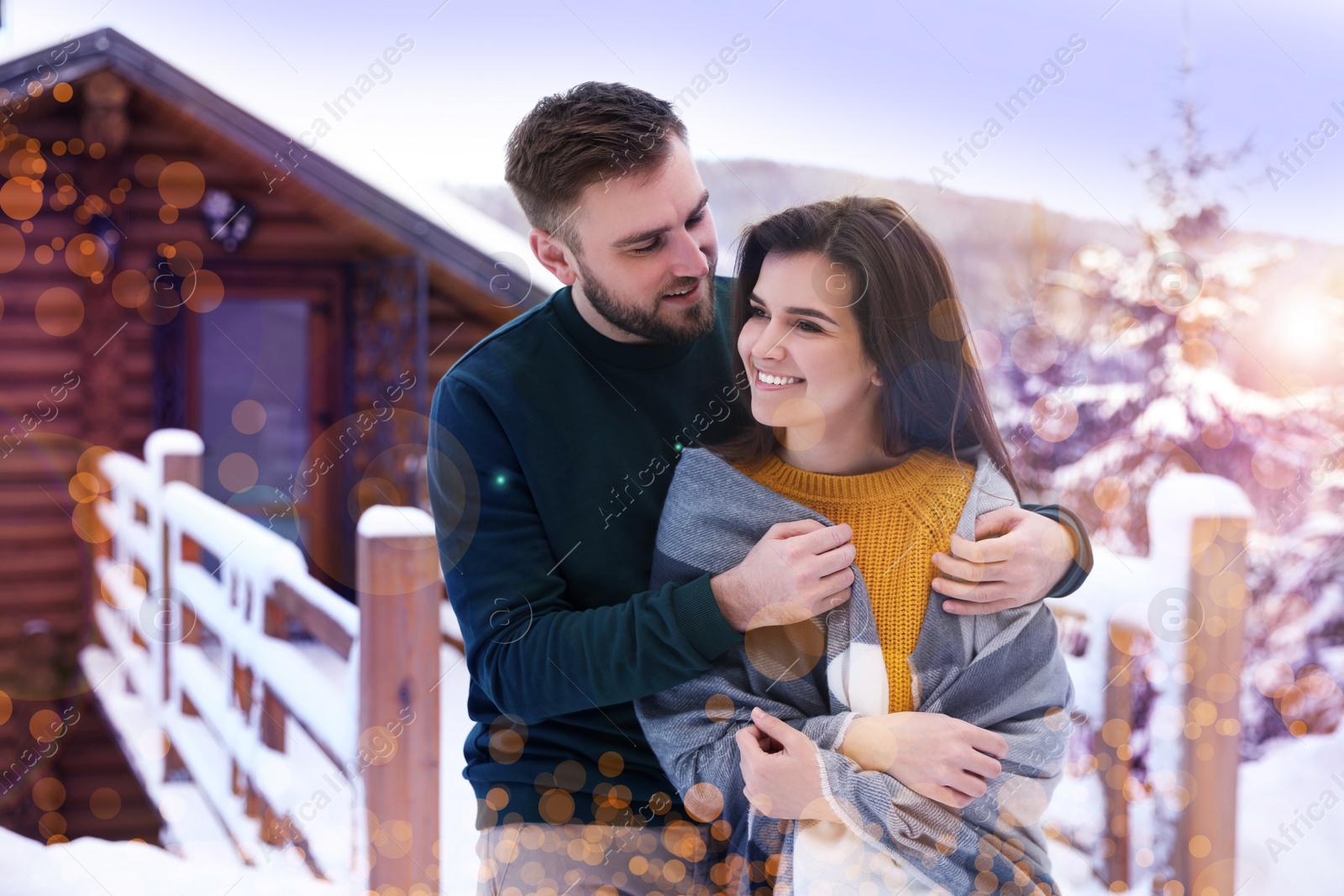 Image of Lovely couple spending time together on snowy day. Winter vacation