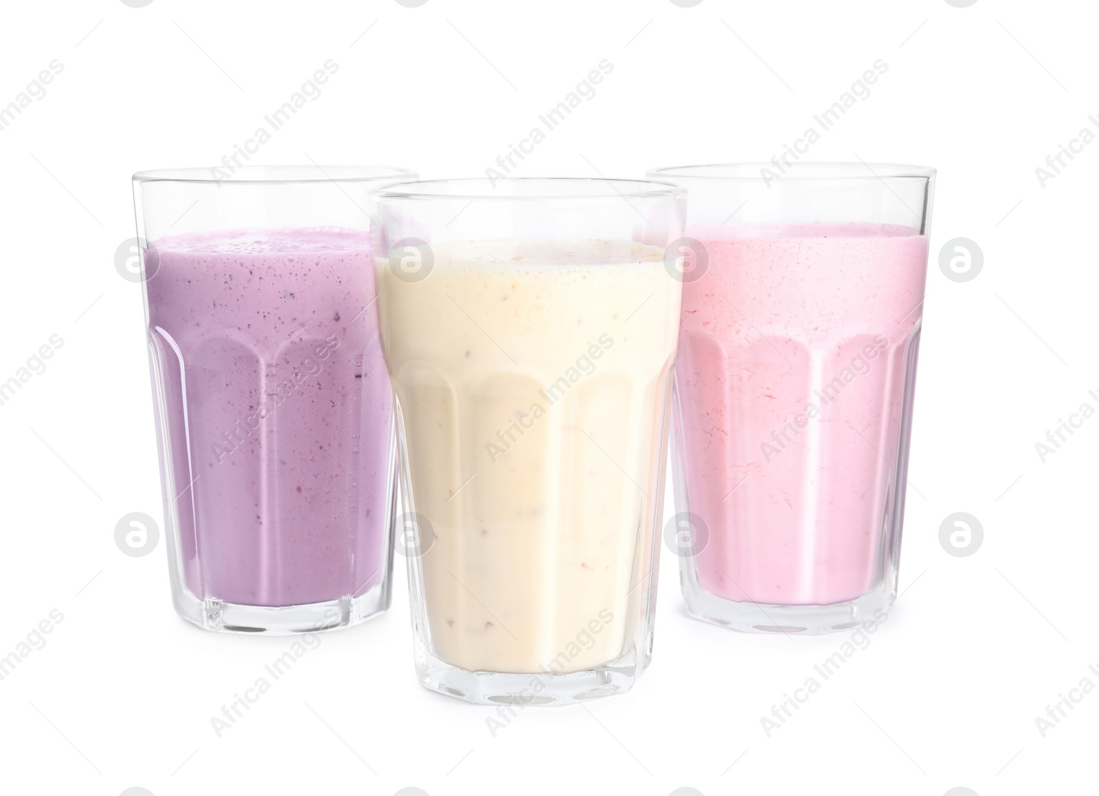 Photo of Different tasty milk shakes isolated on white