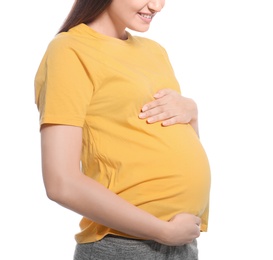 Young pregnant woman in casual clothes on white background