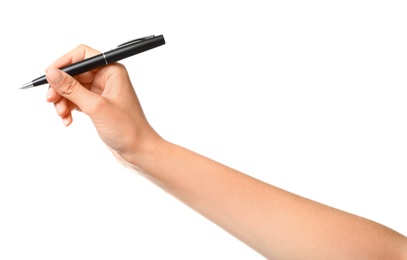 Young woman holding pen on white background, closeup